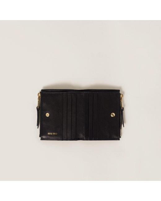 Miu Miu Black Logo Embossed Zipped Wallet