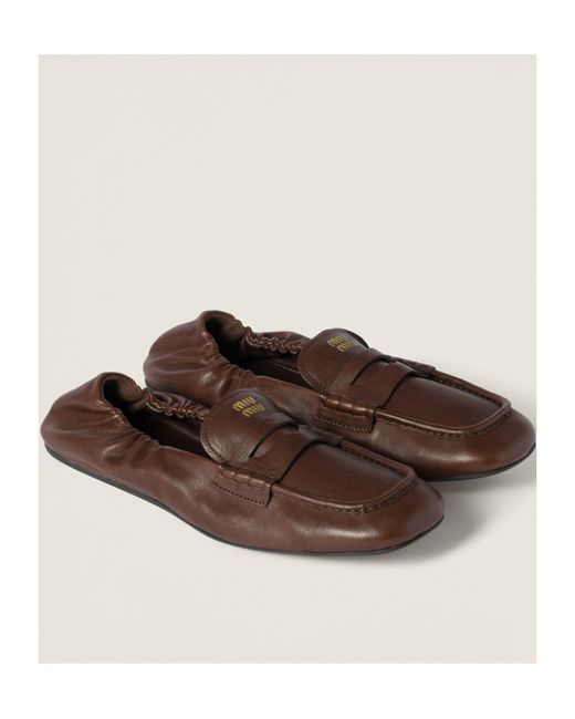 Miu Miu Embossed-Logo Square Toe Loafers in Brown | Lyst