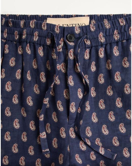 Valentino Blue Lightweight Cuffed Linen Trousers With Voyage Imaginaire Print for men