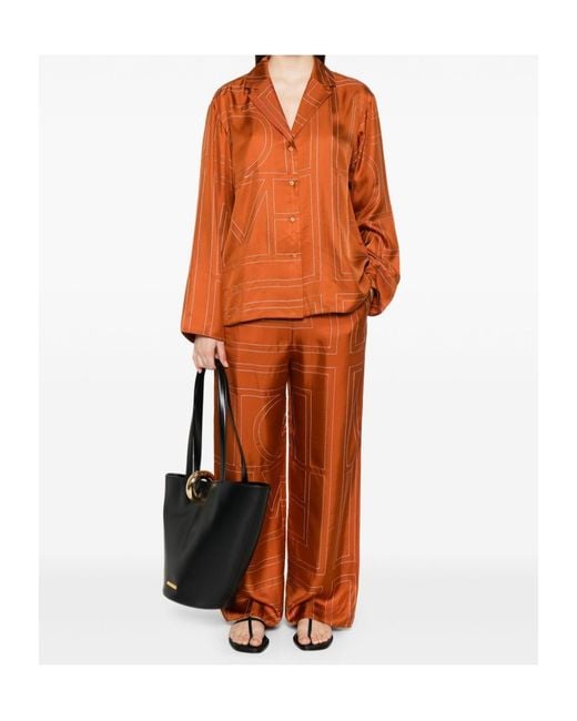 Totême Orange Shirt With Notched Collar And All-Over Logo Print