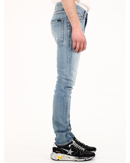 Saint Laurent Blue Distressed Skinny-Fit Denim Trousers With Belt Loops for men