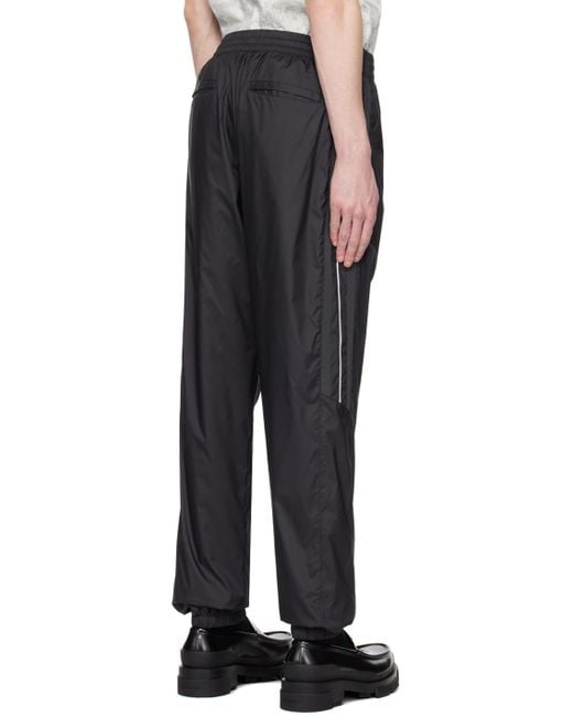 Givenchy Black Logo Embroidered Track Pants for men