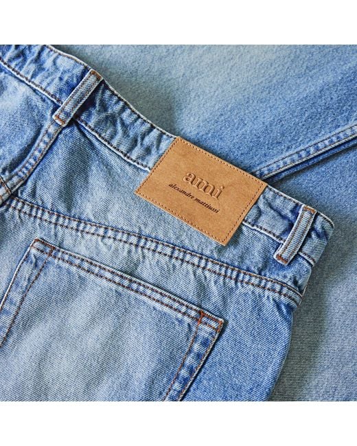 AMI Blue Solid Color Denim Long Pants for men
