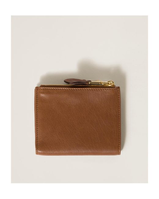 Miu Miu Brown Logo Embossed Zipped Wallet