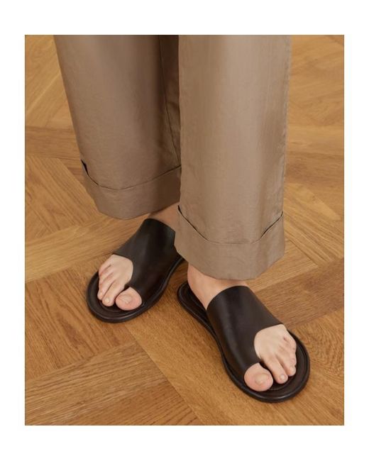 The Row Black Flat Sandals