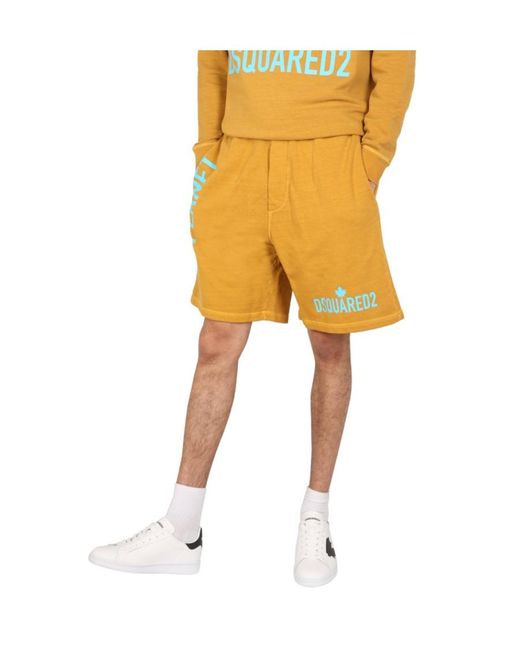 DSquared² Yellow Logo Printed Bermuda Shorts for men