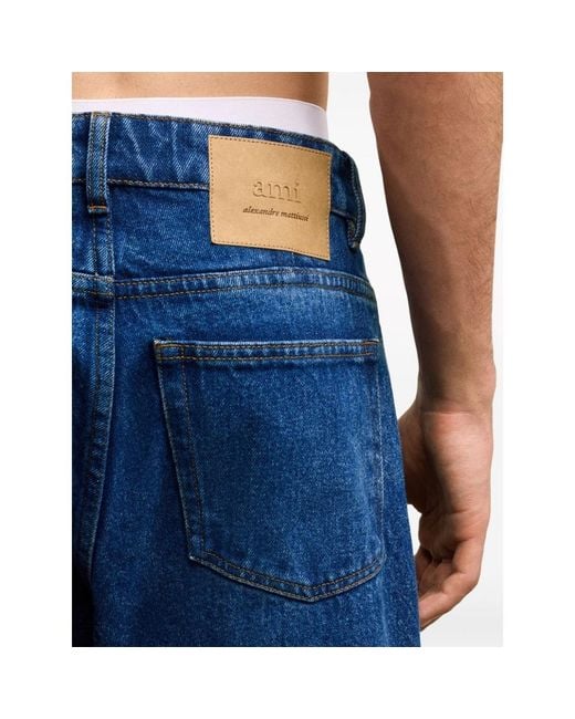 AMI Blue Logo Patch Tapered-Fit Jeans for men