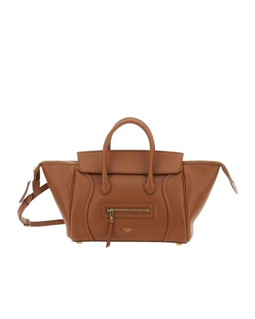 Céline Brown Handbag With Adjustable And Removable Shoulder Strap And Embossed Logo Lettering On The Front