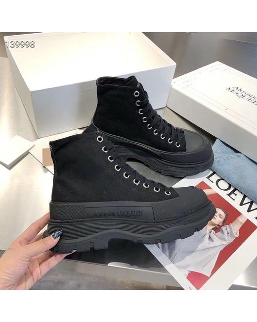 McQueen Black Tread Slick Boots for men