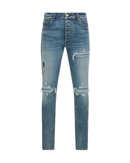 Amiri Blue Distressed Slim Jeans for men