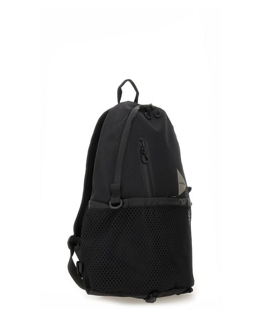 And Wander Black Logo Printed Backpack for men