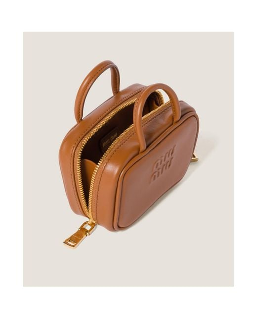 Miu Miu Logo-Embossed Trick Keychain in Brown | Lyst