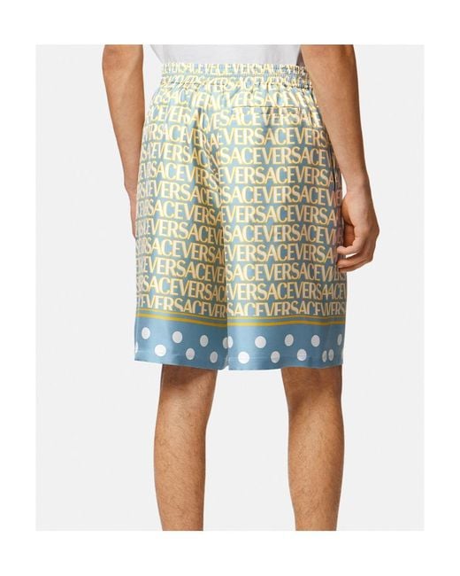 Versace Multicolor All-Over Logo Printed Knee-Length Shorts for men