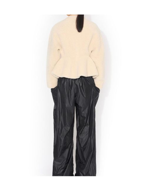 Alaïa Natural Alaïa Shearling Peplum Jacket