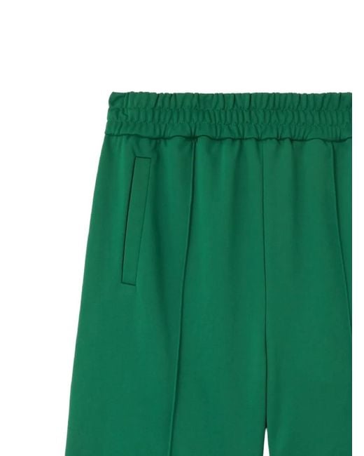 Palm Angels Green Curved Logo Track Shorts for men
