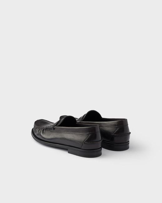 Prada Black Distressed Penny Loafers for men