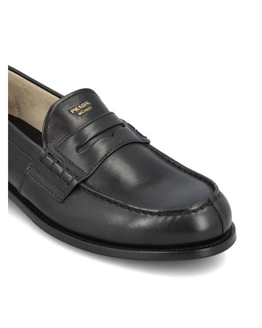 Prada Black Logo Printed Slip-On Loafers for men