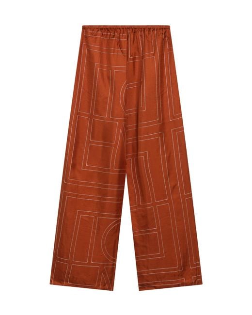 Totême Orange Monogram Silk Pajama Trousers