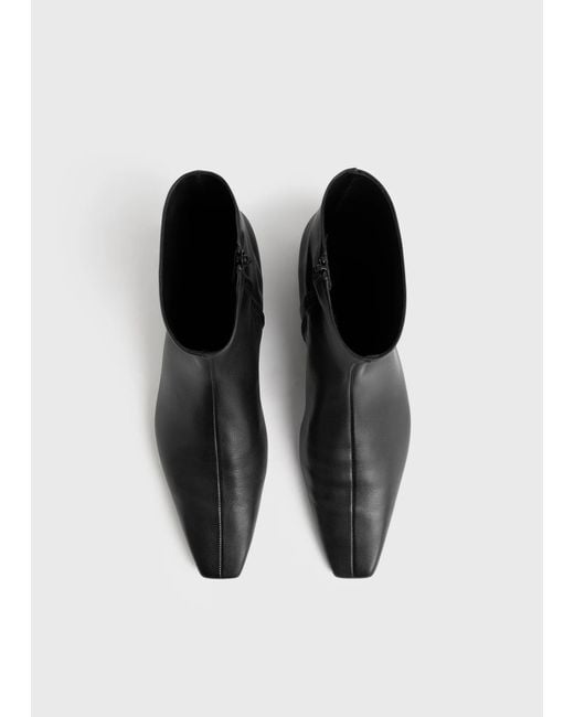 Totême  Black Zipped Leather Boots