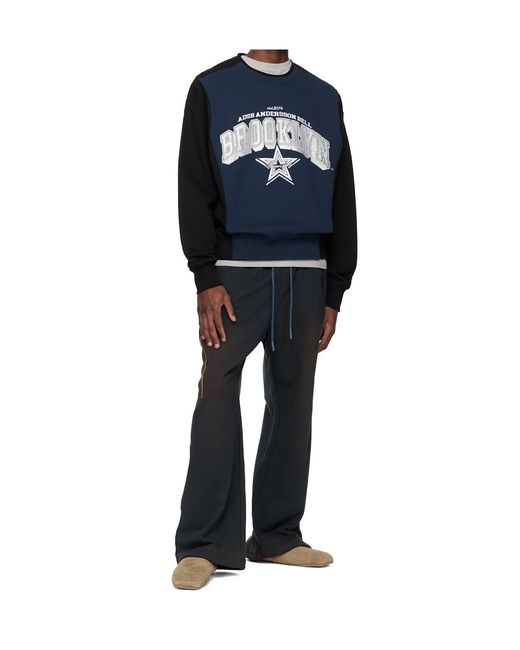ANDERSSON BELL Blue Piping Dyed Sweatpants for men