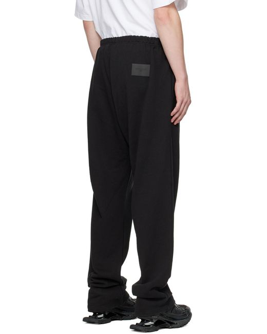 we11done Black Logo-Print Track Pants for men