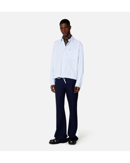 AMI Blue Flared Bootcut Trousers for men
