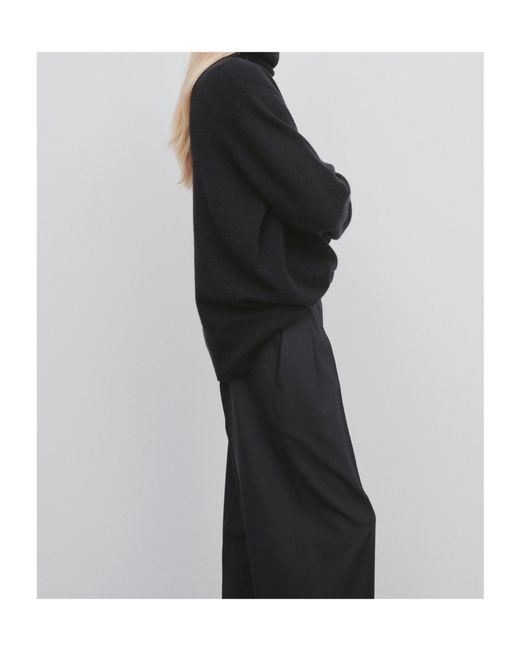 The Row Black Turtleneck Sweater