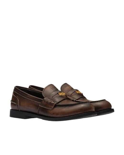 Miu Miu Brown Logo Embossed Slip-On Penny Loafers
