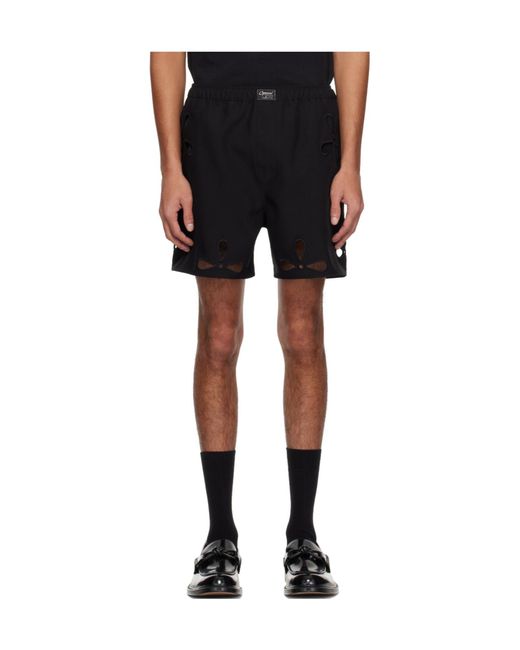 Coperni Black Petal Cut-Out Shorts for men