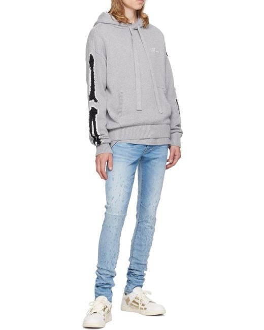 Amiri Blue Shotgun Ripped Skinny Jeans for men