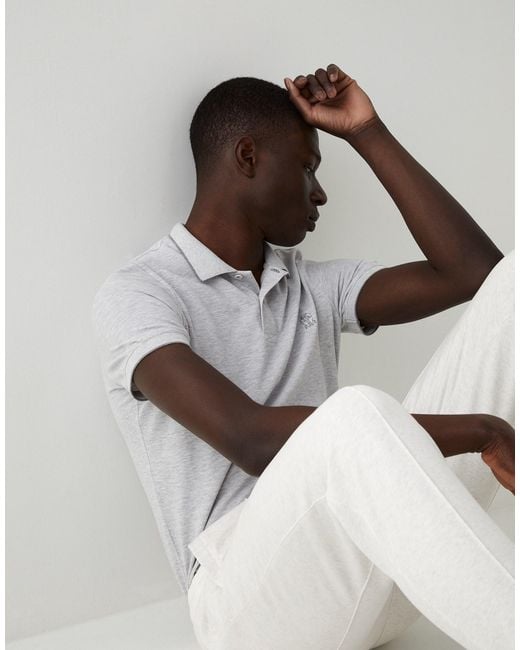 Brunello Cucinelli White Embroidered Logo Polo Shirt for men