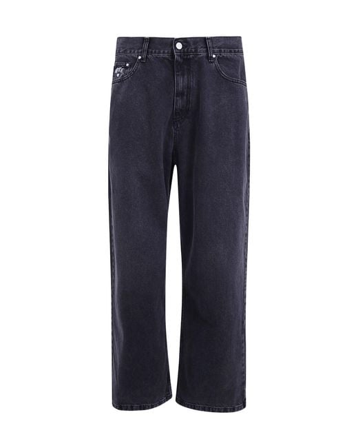 Arte' Blue Faded-Effect Logo-Patch Jeans for men