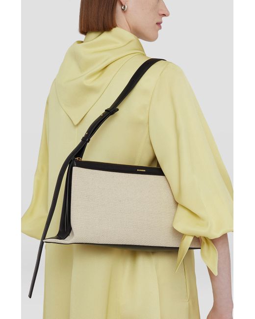 Jil Sander Metallic Logo Detailed Large Shoulder Bag