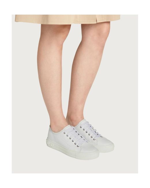 Ferragamo White Logo Embossed Low-Top Sneakers