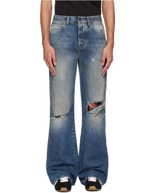 Amiri Blue Ripped-Knees Bootcut Denim Jeans for men