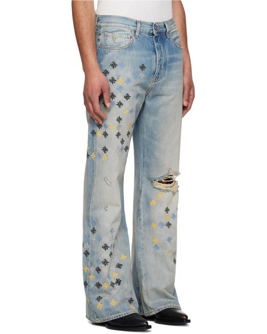 Amiri Blue Ma Quad Embroidered Distressed Flared Jeans for men