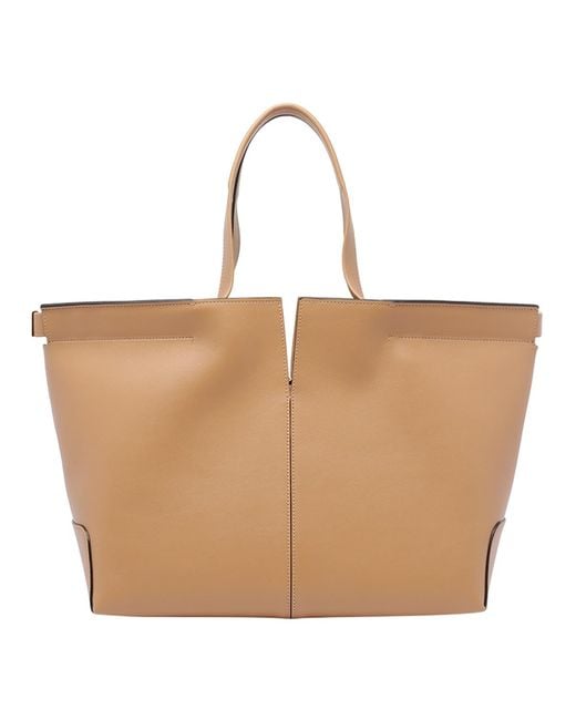 Tod's Natural Logo Debossed Medium Tote Bag