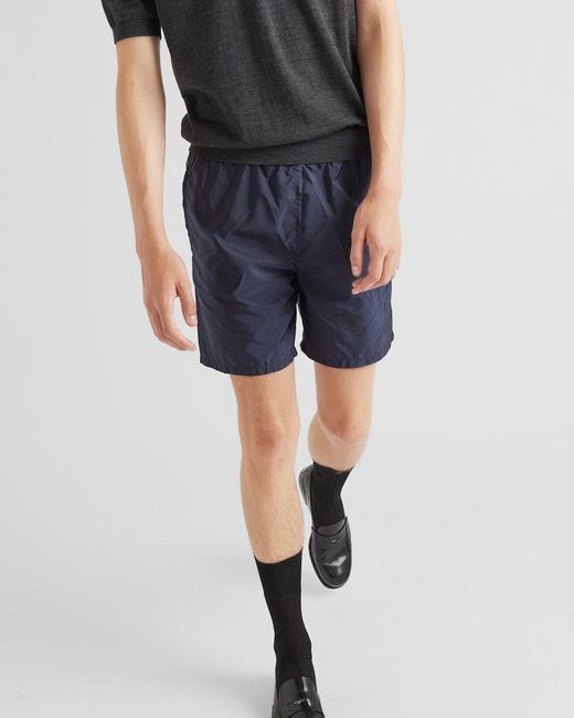 Prada Blue Triangle Logo Plaque Elastic Swim Shorts for men