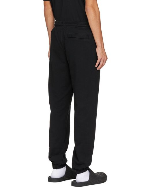 Marcelo Burlon Black Logo Loose Sweatpants for men