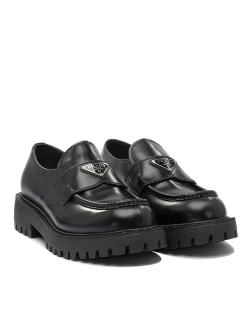 Prada Black Logo Plaque Slip-On Loafers for men