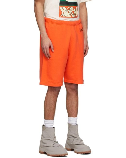 Heron Preston Orange Logo Patch Bermuda Shorts for men