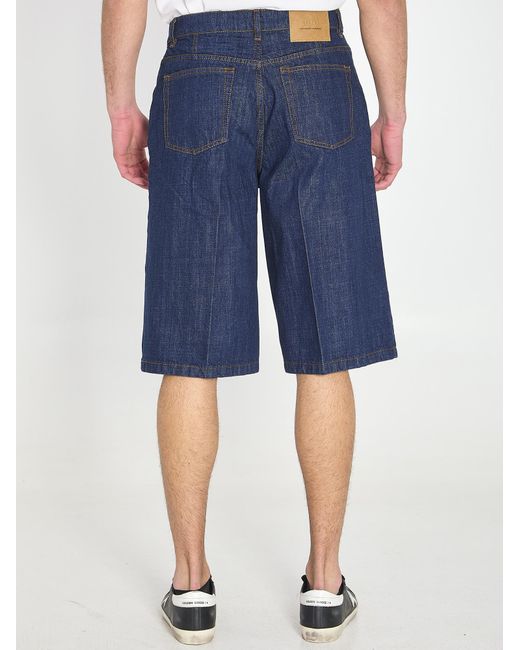 AMI Blue Pressed Crease Denim Bermuda Shorts for men