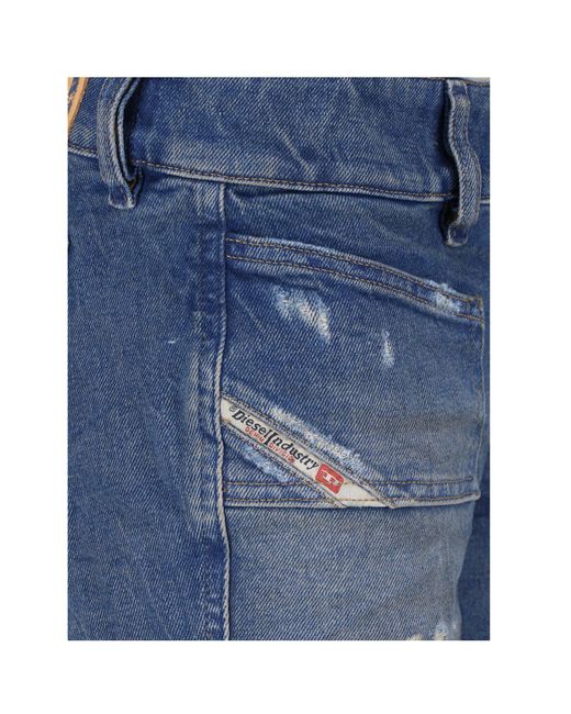 DIESEL Blue Flared Distressed Jeans