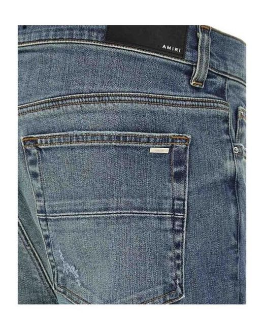 Amiri Blue Ripped Jeans for men