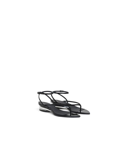 Alaïa White Invisible Flip-Flops