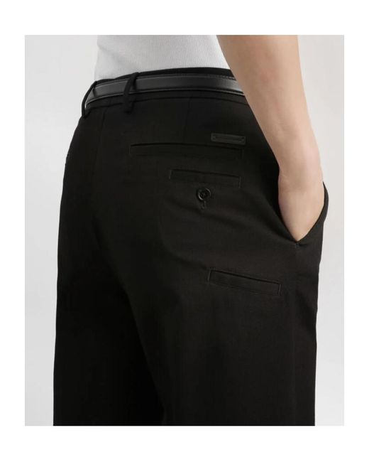 Dolce & Gabbana Black Logo Patch Trousers for men