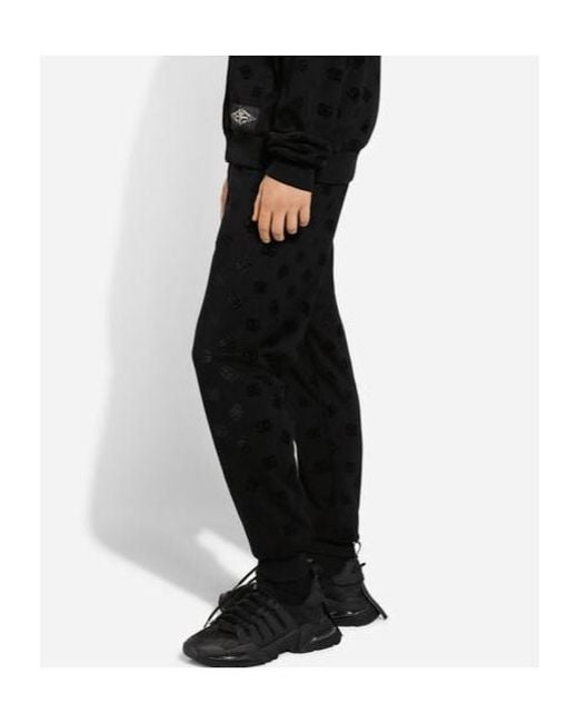 Dolce & Gabbana Black Monogram-Embossed Cotton Track Pants for men