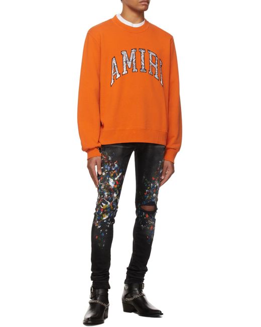 Amiri Black Paint Print Distressed Skinny Jeans for men