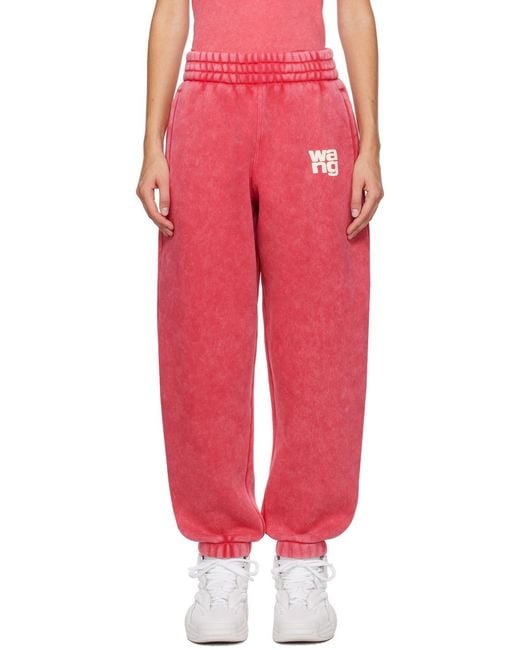 Alexander Wang Red Rubberised-Logo Cotton-Blend Track Pants