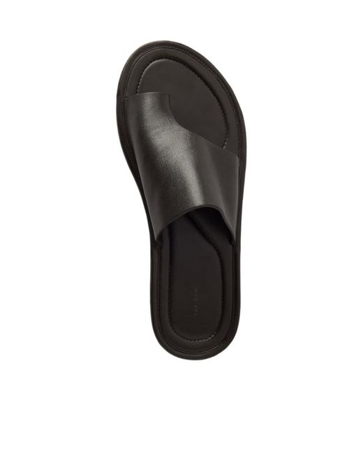 The Row Black Flat Sandals
